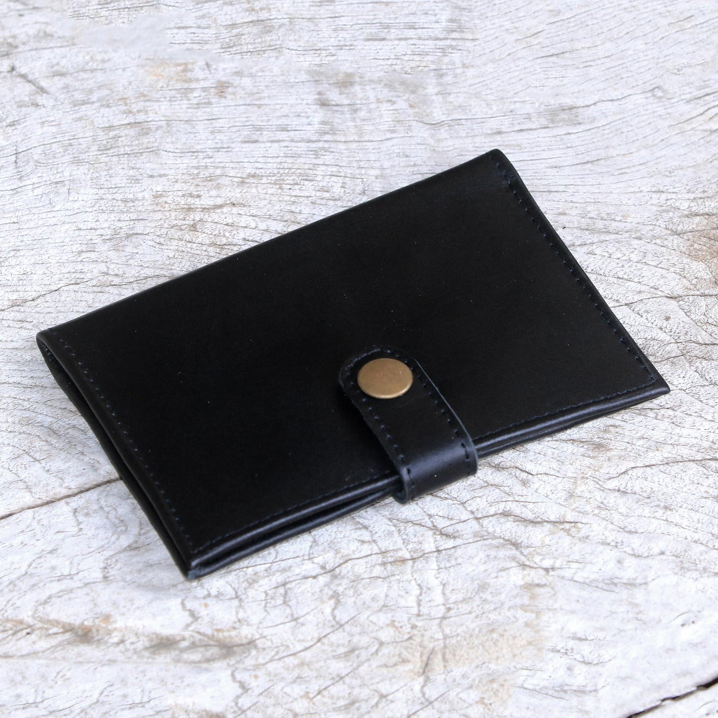 Gringsing Getaway in Black Fair Trade Handcrafted Black Leather Passport Holder