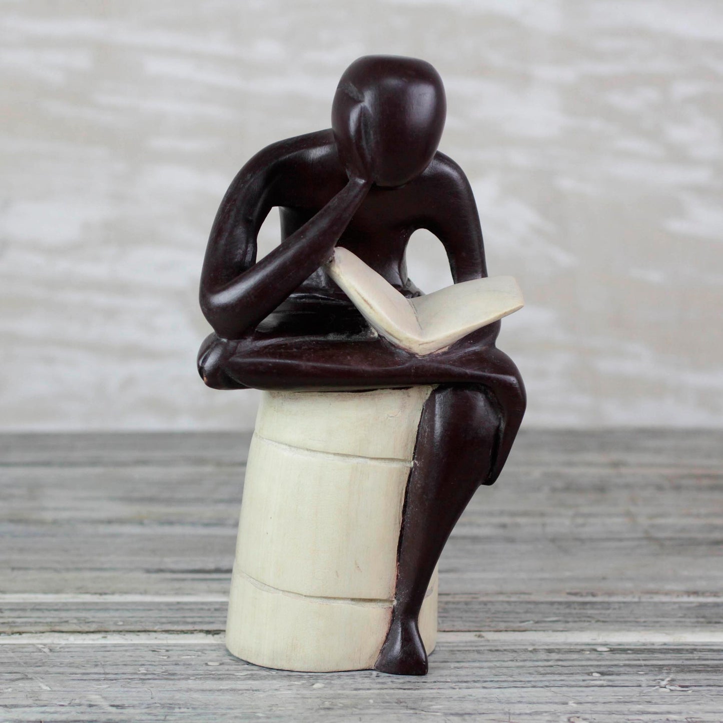 Thoughtful Reader Sese Wood Sculpture of a Reading Person from Ghana