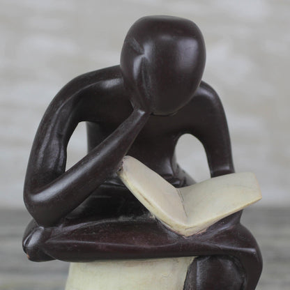 Thoughtful Reader Sese Wood Sculpture of a Reading Person from Ghana