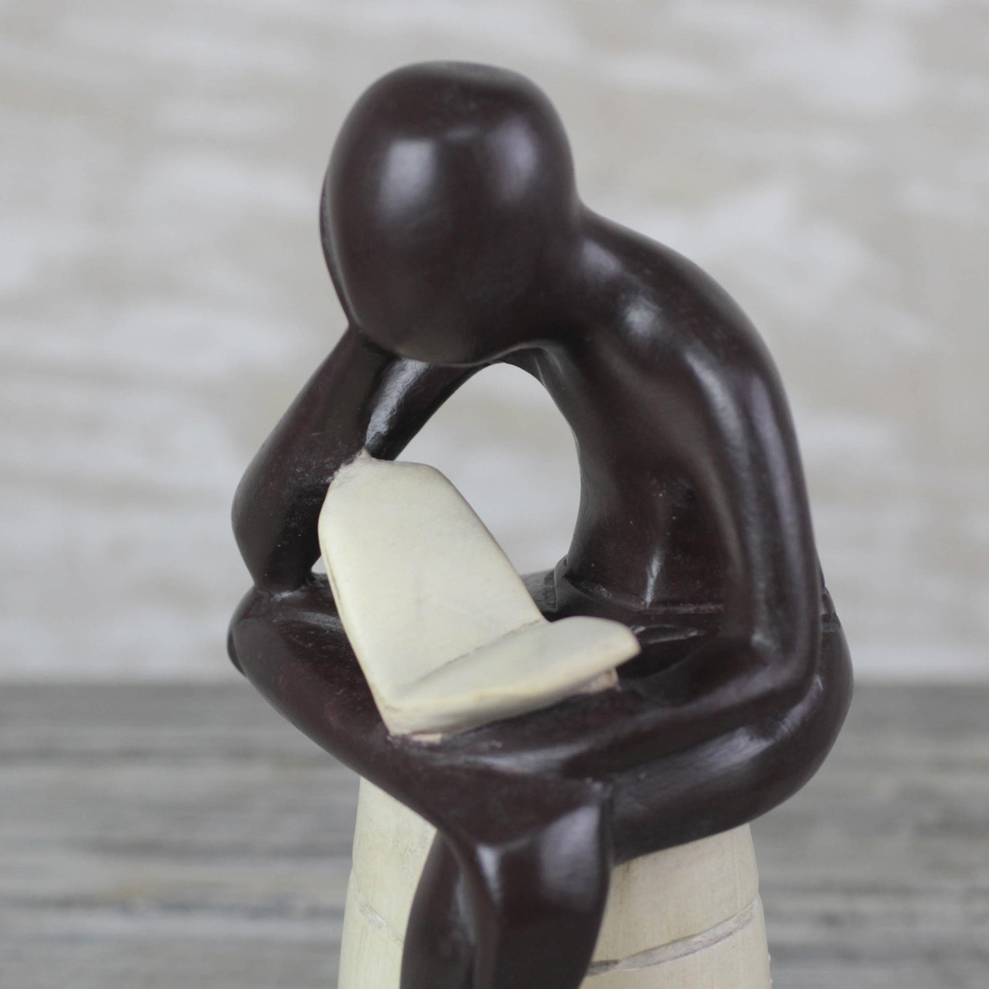 Thoughtful Reader Sese Wood Sculpture of a Reading Person from Ghana