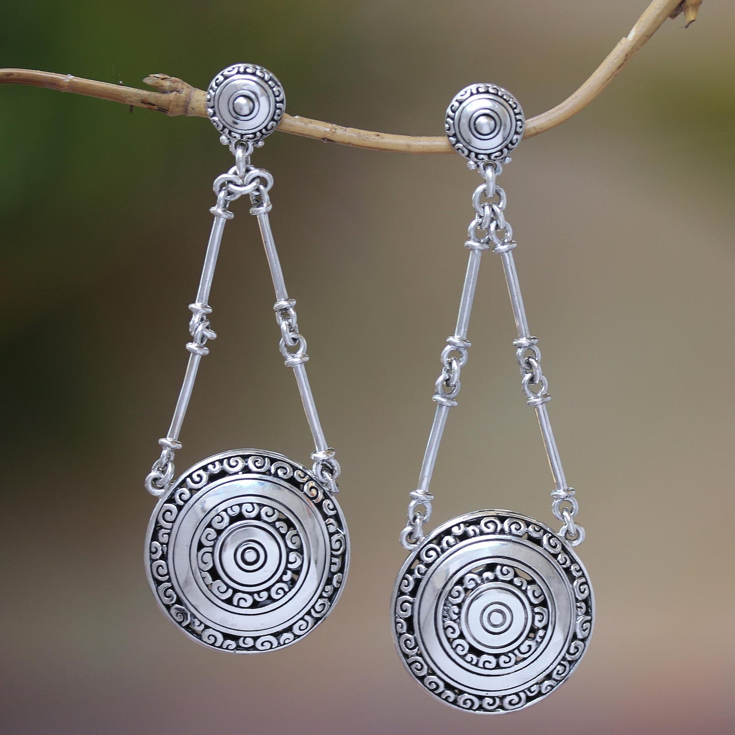 Hiding Eden Sterling Silver Buddha Curl Motif Dangle Earrings from Bali