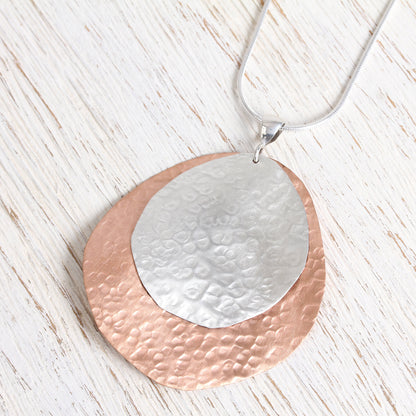 Rippling Eclipse Sterling Silver and Copper Pendant Necklace from Mexico