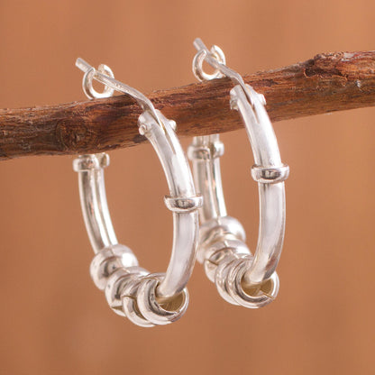 Swing and Sway Sterling Silver Hoop Earrings with Sliding Rings from Peru