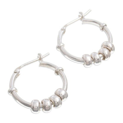 Swing and Sway Sterling Silver Hoop Earrings with Sliding Rings from Peru