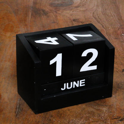 Counting the Days in Black Wood Perpetual Calendar in Black from Bali