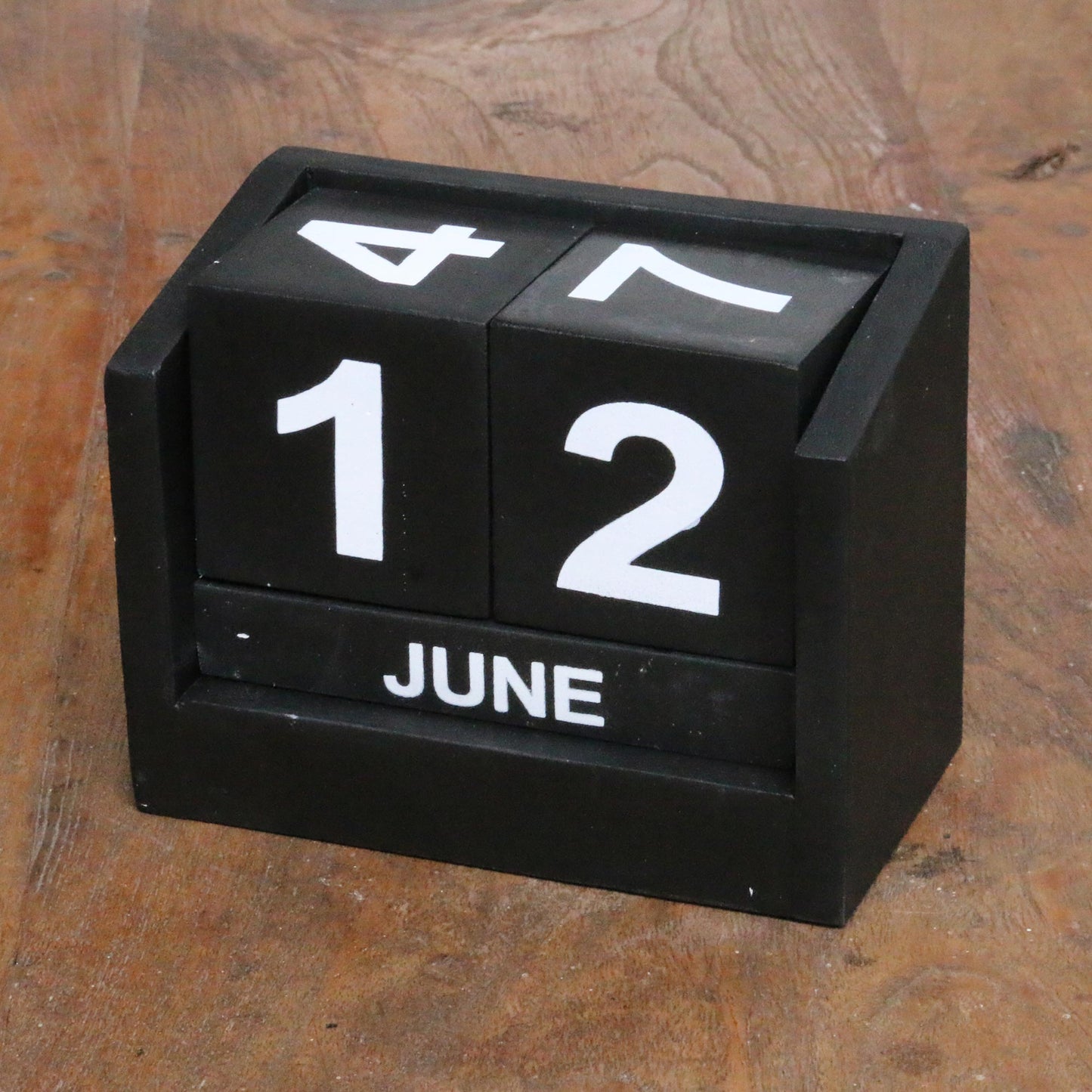 Counting the Days in Black Wood Perpetual Calendar in Black from Bali