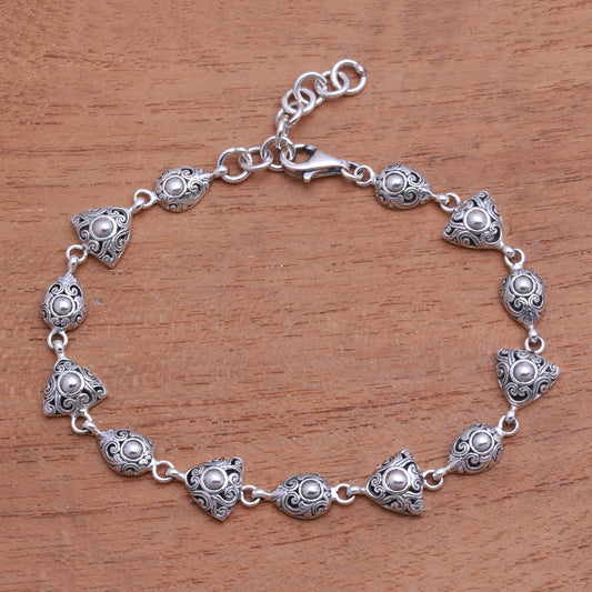 Elegance of Swirls Swirl Pattern Sterling Silver Link Bracelet from Bali