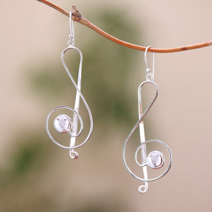 Gleaming Melody Sterling Silver Treble Clef Dangle Earrings from Bali