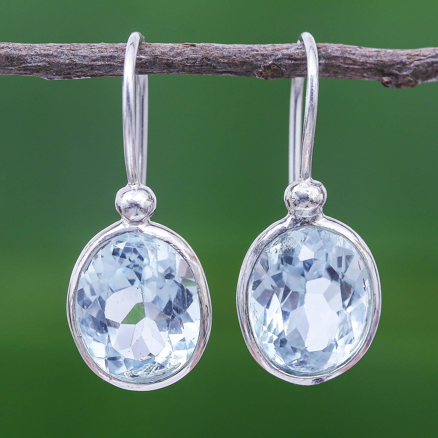 Noonday Sky Oval Faceted Blue Topaz Sterling Silver Dangle Earrings