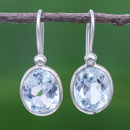 Noonday Sky Oval Faceted Blue Topaz Sterling Silver Dangle Earrings