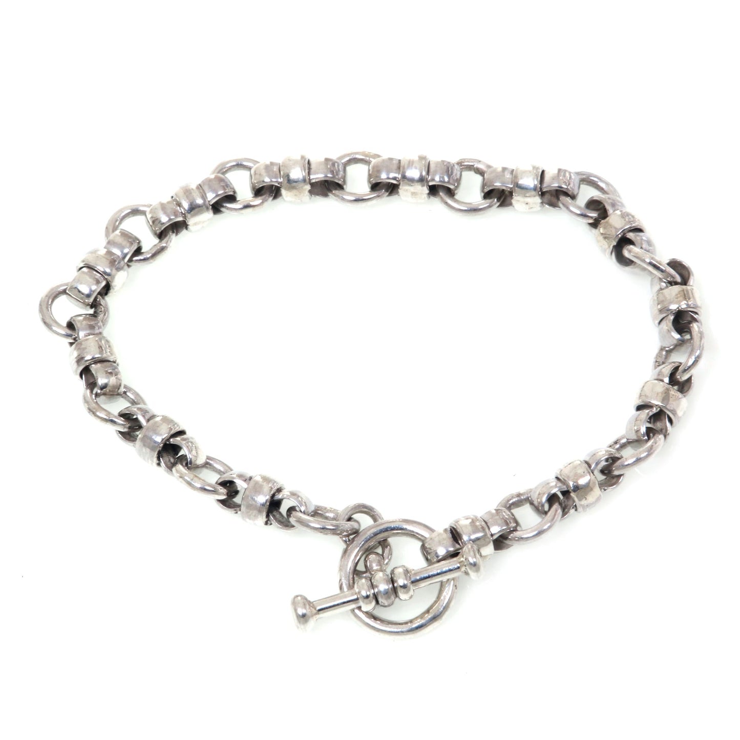 Eight Motif Sterling Silver Link Bracelet