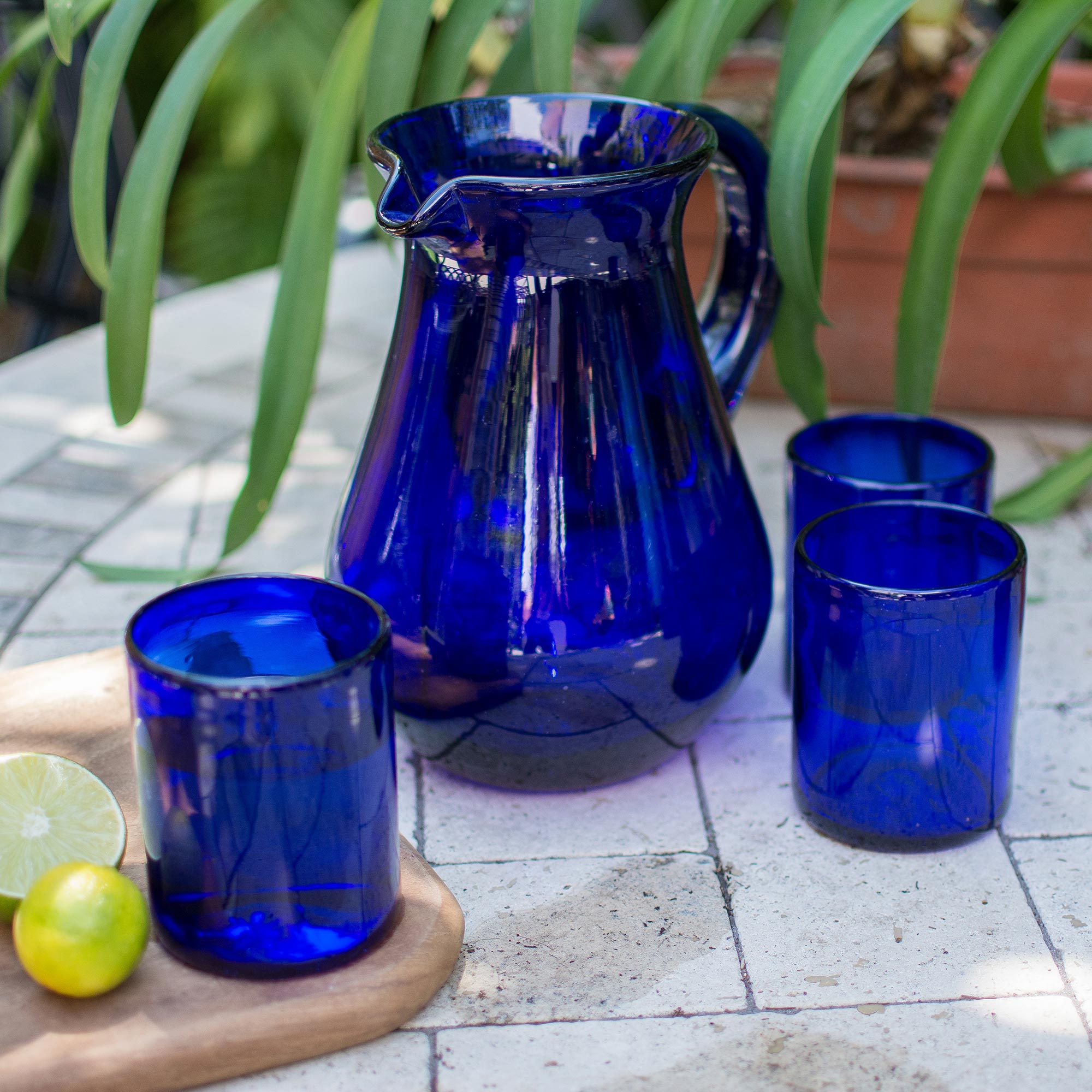 Blue vintage pitcher and outlet glasses