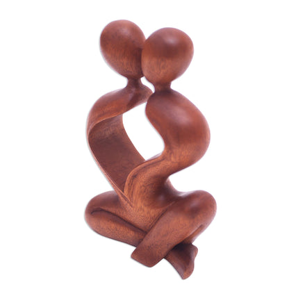 Heartfelt Kiss Romantic Suar Wood Sculpture